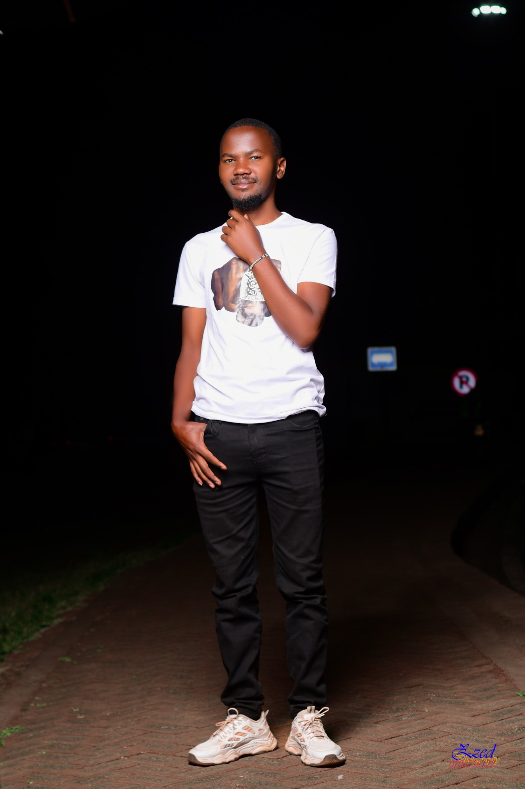 John Mutiso - Graphic Designer